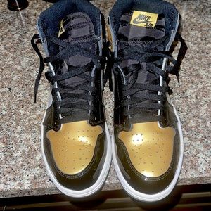 Jordan 1s black and gold patent leathers